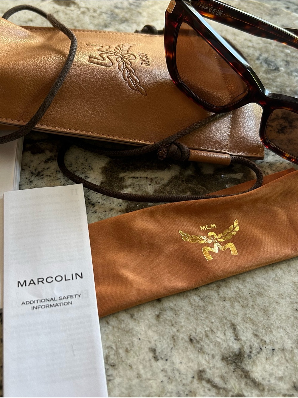 MCM Women’s Tortoiseshell Sunglasses with Brown Leather Case and Gold Logo